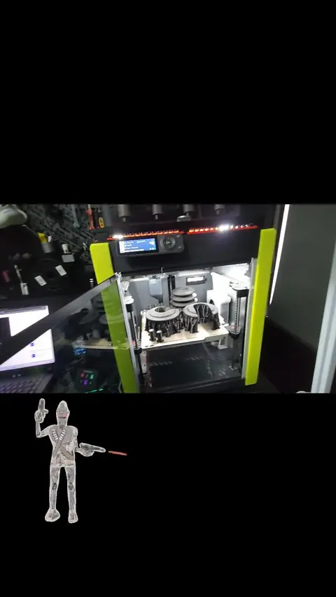 Droide IG-11 impreso en 3D sobre fondo negro